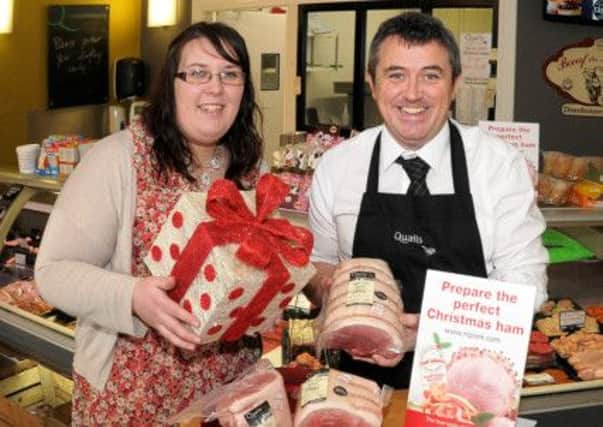 Celebrating their Northern Irish Quality Assured Christmas hams are renowned local butcher Joe Quail from Quails Fine Foods and Danielle Stevenson from award winning local pork product supplier FC Robinson.