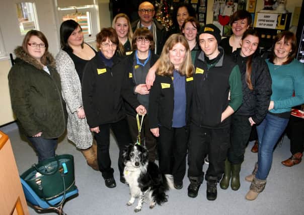 Mary Kearney (centre), who is retiring from the Dogs Trust after 30 years, is pictured with staff members at a special function in her honour. INBT51-238AC