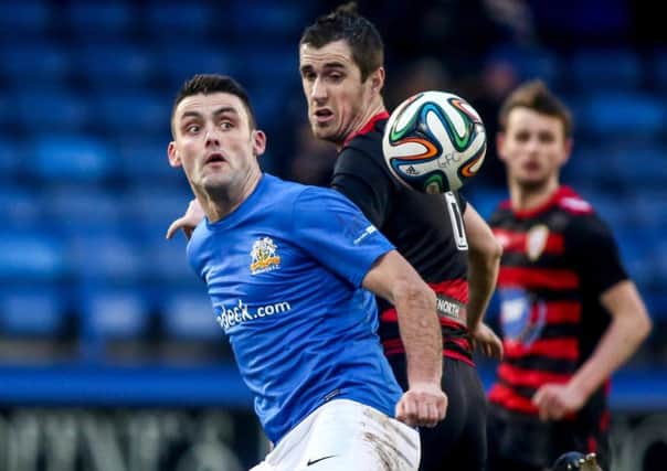 Glenavon's Eoin Bradley and Coleraine's David Ogilby in action during Saturdays game a Mourneview Park. Pic by Presseye