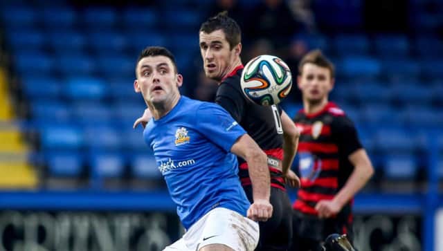 © Press Eye Ltd Northern Ireland- 13th December 2014 - Glenavon vs Coleraine

Pictured is Glenavon's Eoin Bradley and Coleraine's David Ogilby in action during Saturdays game a Mourneview Park in Lurgan 

Picture - Kevin Scott / Presseye