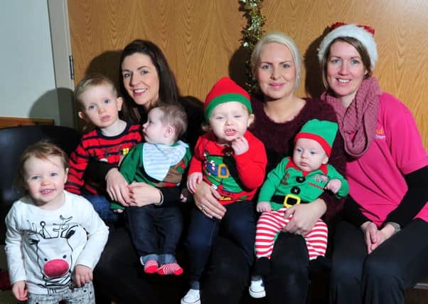 Enjoying the G-old SureStart Maghera Christmas party held in the Lurach Centre last Friday.INMM5114-377