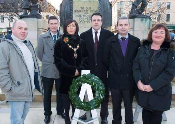 The Mayor Councillor Brenda Stevenson pictured with Trevor Temple from The Diamond War Memorial Project, Councillor John Boyle, Councillor Gerard Diver, Seamus Breslin from the Templemore Great War History Society and Margaret Edwards from Derry City Council's Museum service pictured following a talk on the nationalist contribution to the Great War in the Tower Museum which was followed by the laying of a Laurel Wreath at the Cenotaph in Londonderry. Picture Martin McKeown. Inpresspics.com 05.12.14