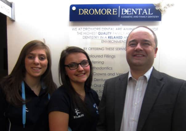 Lucy Cowan sponsorship co-ordinator, Tara Malcomson 1st XI captain and Gavin Maguire of Dromore Dental.