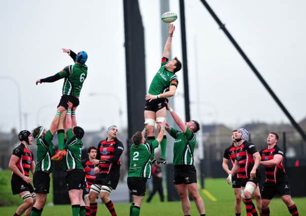 City of Derry's David Houston superbly wins a line-out during Saturday's Ulster Senior League clash at Rainey Old Boys at Hatrick Park. INMM5114-418
