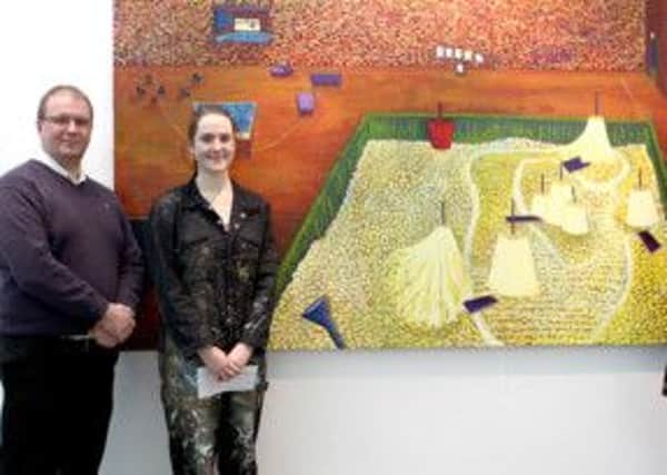 Former Cambridge House Grammar School pupil Emily Hill (23), second from left, picked up second prize of £250 in the annual SPD painting awards at the art school for her painting Cullybackey Sandpit, after being awarded third place last year. She is pictured here with SPD Group HSEQ Manager, Stuart Insch and PA to the Managing Director, Laura Mylles, who made up this years judging panel.