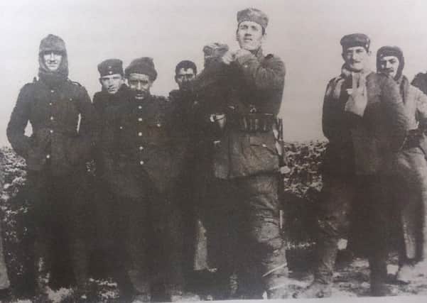 Men of the 2nd Battalion Royal Dublin Fusiliers pictured with German soldiers in No Man's Land on Boxing Day, 1914.
