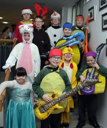 CLASS KIDS. Pictured are pupils from Class B, who performed at their Christmas concert on Monday.INBM52-14 032SC.