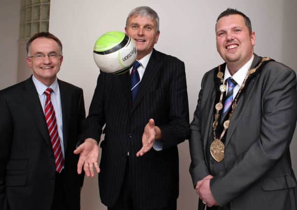Health Minister Jim Wells at the launch of the Lisburn Physical Activity Loyalty Scheme at the Island Civic Centre pictured with (l-r) Professor Frank Kee, Director of the Centre of Excellence for Public Health at QUB and the Mayor of Lisburn, Councillor Andrew Ewing.