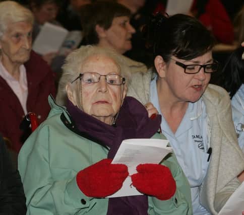 Senior citizens and carers taking part in the festive event at Downshire School. INCT 52-754-CON