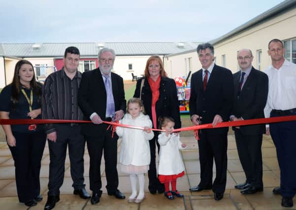 Pictured officially opening the new Recreational Garden at Lakeview Hospital, Londonderry are from left to right: Kirsty McKelvey, Manager, Berryburn; Ryan Burton; Joe and Margaret Healey with their two grandchildren Aoife and Isla; Felix Healey, ex Derry City Football legend and ex Northern Ireland International; Trevor Millar, Western Trust Director of Adult Mental Health and Disability Services and William Murray.