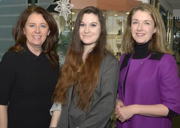 Former New-Bridge Integrated College student Tara Curran (centre) who came joint first, with full marks, in A Level Art in Northern Ireland with Principal Anne Anderson and Head of Art Eimear McKeown as they set off for the Stormont Hotel for the CEA Awards Ceremony. ©Edward Byrne Photography INBL1451-218EB