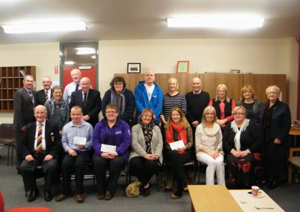 The Londonderry/Derry District Charities along with Midweek President David Caldwell; Chairman Sam McPherson; Treasurer Robert Thompson and Retiring Patron Lexie Miller.