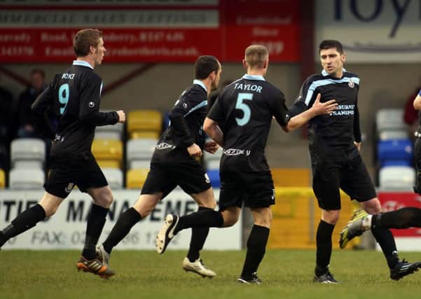 Ballymena United's  David Munster celebrates his goal.
 in today's win at Institute. Picture: Press Eye.