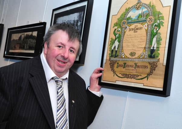 Declan McNally checks out this old piece of memorabilia at the Irish National Forester's Cookstown Branch 125th Anniversary exhibition launch night.INMM5114-339