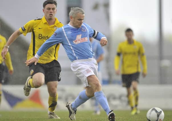 Gary McCutcheon and Brian McCaul - pictured here playing for Glenavon - will be Ballymena United team-mates in January after the striker's return to the Showgrounds. Picture: Press Eye.