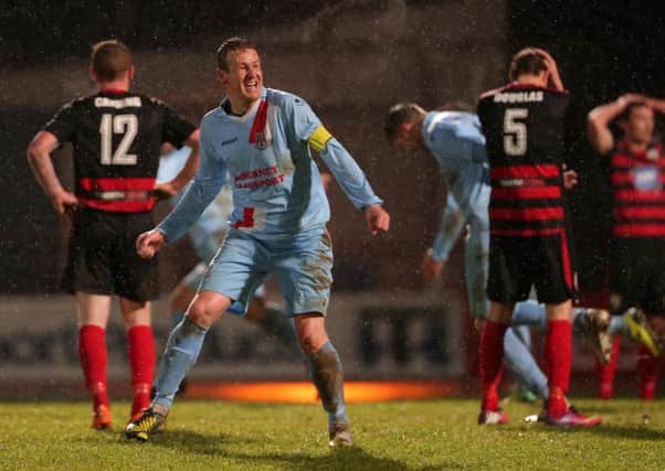 Allan Jenkins celebrates as  Matthew Tipton scores the winner for Ballymena United in the Boxing Day win over Coleraine. Picture: Press Eye.