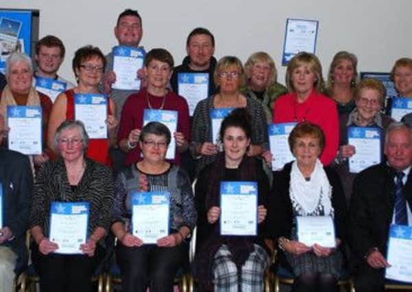 Volunteers receiving their recognition awards at the Cookstown and Magherafelt Volunteer Centre.