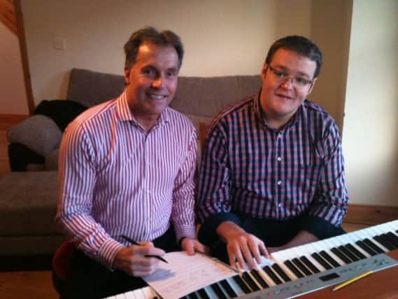 Tony Morrison, conductor of Lets Sing Gospel choir with Jonny Boyd, musical director. inbm01-15s