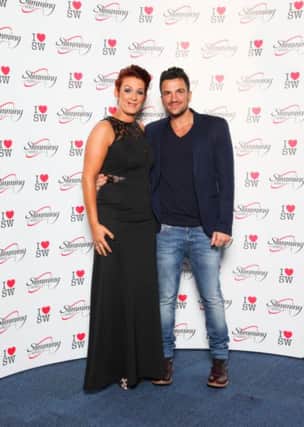 Slimming World Consultant Sharon McAlinden cuddles up to singer and TV presenter Peter Andre