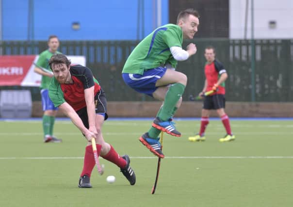 Ballymena's Matt O'Neill takes evasive action as Cliftonville's Dale Curragh clears the ball during Thursday's Sussex Regiment Cup final at Deramore. Picture: Press Eye.