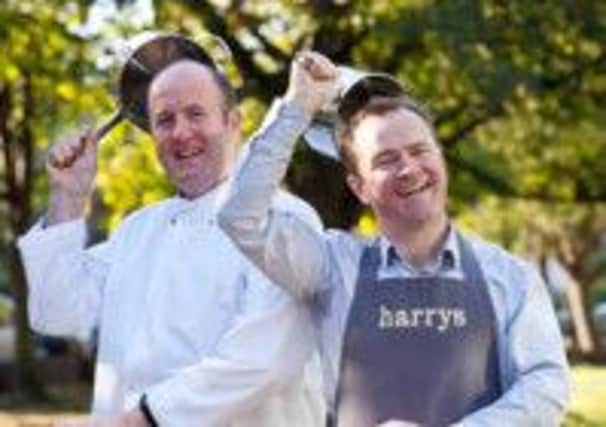 Derek Creagh (left) and Donal Doherty celebrate the Georgina Campbell awards for Best Chef and Best Newcomer.