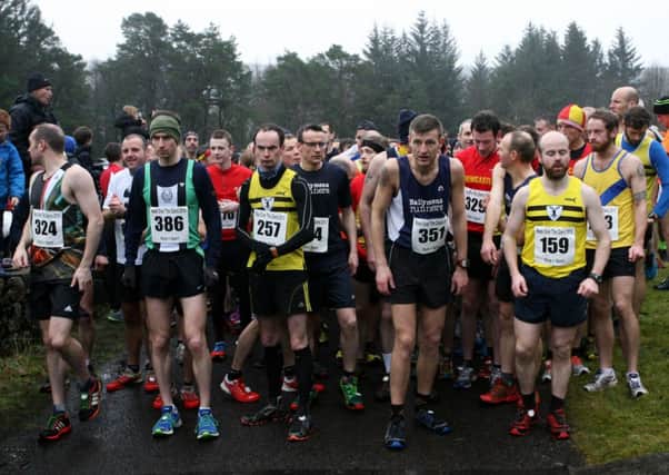 Competitors line up at the start of the annual Race over the Glens on New Years Day. INBT02-208AC