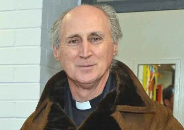 Rev Neil Cutcliffe.