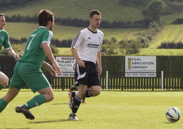 Conor Macken distributes possession for Rathfriland Rangers. Pic by Iain McDowell/Rathfriland FC