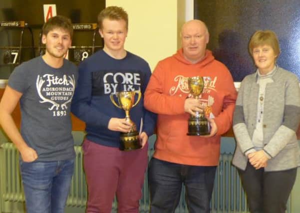 Organisers Chris Snoddy (left) and Elizabeth Woods pictured with Churches' Pairs Winners Dale and Tommy Bodles. INLT 02-906-CON