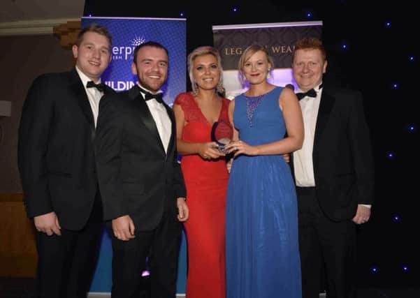 Larne-based company Stealth Translations has won Exporter of the Year in the Enterprise Northern Ireland Awards.
Pictured with the award are (left to right)  Neil Kirk, Project Manager; Stephen Carlisle and Olya Magill, Business Development Executives; Grace Weir, Director and Stephen Weir, Managing Director.
 Stealth Translations, which has its head office in LEDCOMs Willowbank Business Park, now operates in more than 23 countries around the world providing translations to businesses in the fields of medicine, law, manufacturing, education, finance and technology.

Turn to page 4 for the full story.
