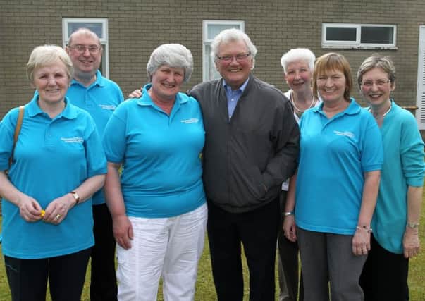 Members of the Ballymena & Antrim Alzheimer's Society committee  at a tea party and balloon launch - just one of the many events which the committee have staged since its formation. Margaret Gurney (centre) with Jackie Fullerton.