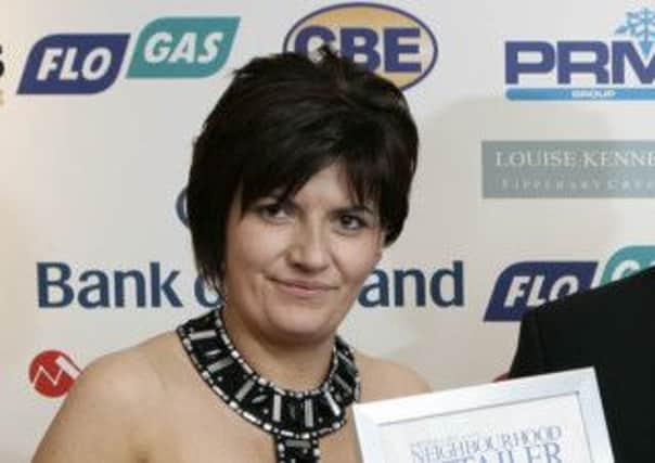 Margaret McVeigh in 2007 receiving an award as SuperValu manager.