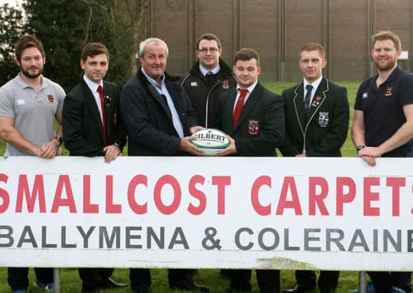 David Small from Smallcost Carpets, one of the sponsors of Cambridge House Rugby Team is pictured with players Sam Nicholl, Aaron Henry and Benjamin McIlroy and coaches Jamie Smyth, John Nicholl and Chris Smyth. INBT48-207AC
