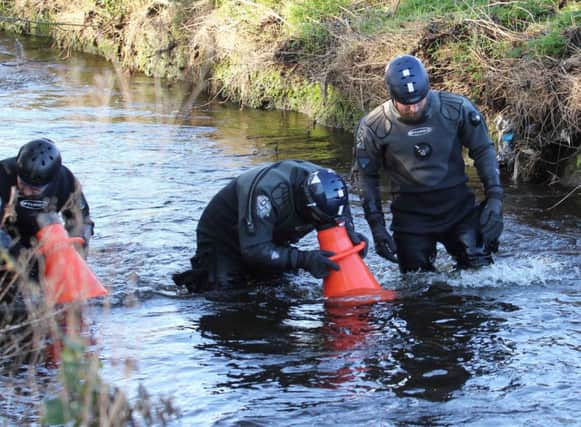 Police investigating the murder of Brian McIlhagga in Ballymoney on Monday night began a search of the area known as the 'Ballymoney burn' today (Thursday). PICTURE BY MARK JAMIESON. INBM03-14