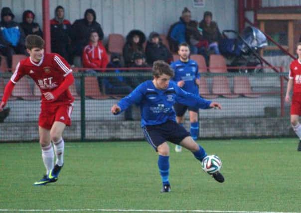 Ballyclare's Joel Cooper plays the ball forward in Saturday's Irish Cup win over Annagh United. INLT 03-904-CON