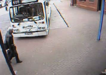 A still from 'The Last Days of Peter Bergmann' showing the eponymous subject at Foyle Street bus depot.