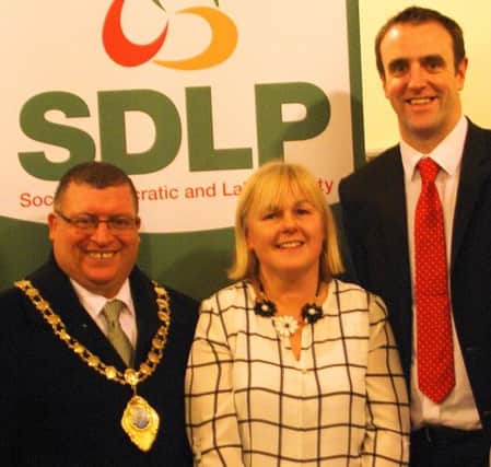 SDLP East Antrim Westminster candidate Margaret Anne McKillop with Larne Mayor Cllr Martin Wilson and SDLP Environment Minister Mark H Durkan at her selection as party candidate for the constituency. INBM03-15