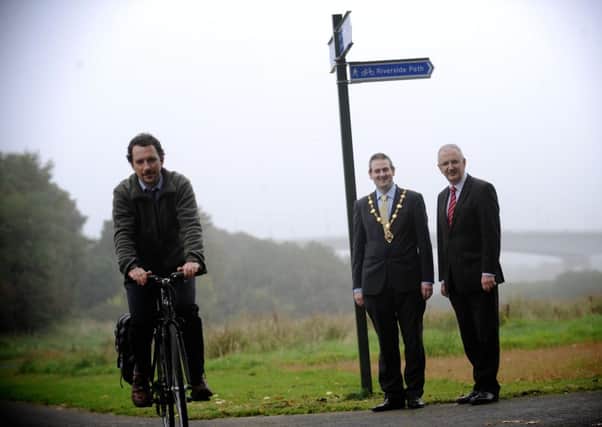 Councillor Martin Reilly, pictured with Transport Minister, Danny Kennedy, at the traffic free greenway for walkers and cyclists at Bay Road. Also Included, is Ross McGill, Sustrans. DER4113SL204 Photo: Stephen Latimer