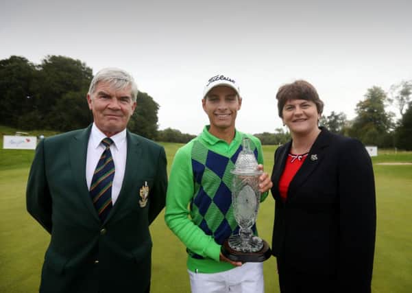 FLASHBACK: Joakim Lagergren, 2014 Northern Ireland Open winner pictured along with Enterprise Minister Arlene Foster and John Carruthers, Captain of Galgorm Castle Golf Club. Picture: Press Eye.