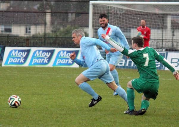 Gary McCutcheon bursts through the Crumlin Star defence during Saturday's Irish Cup win, which sets up a sixth round meeting with Cliftonville.