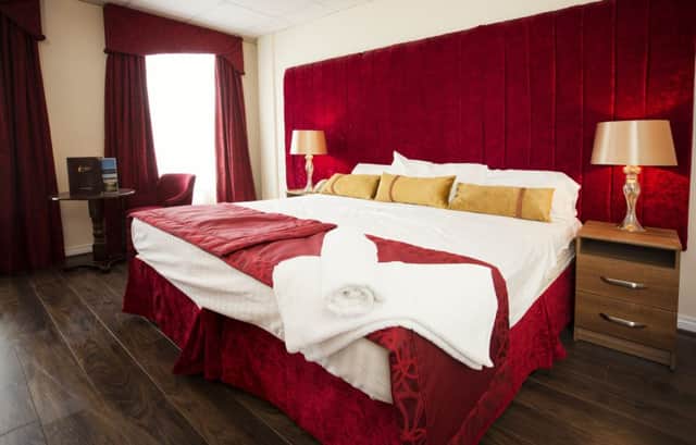 One of the refurbished bedrooms in the Marine Hotel, Ballycastle. INBM04-15