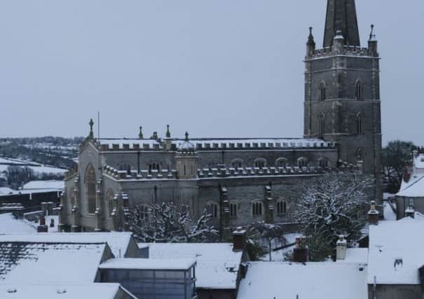 A snow-topped St. Columb's Cathedral. DER0215MC035