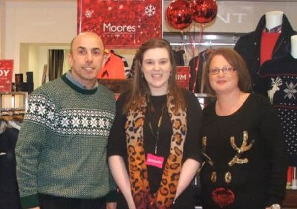 Simon Colquhoun, Store Director, Stephanie Grundon, Causeway Volunteer Centre and Jayne Booth, Moores of Coleraine.