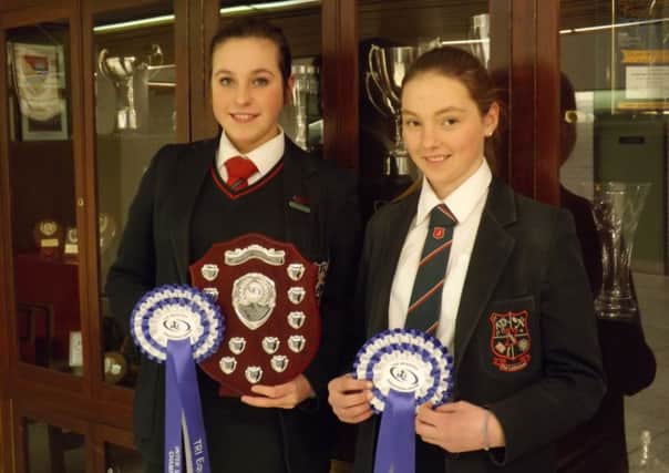 Cambridge House showjumping team members Nikki McNeice and Charlotte Harding.