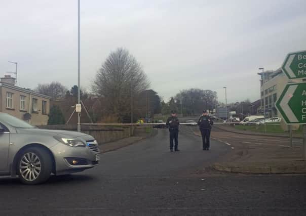Police at Culmore Road on Monday.