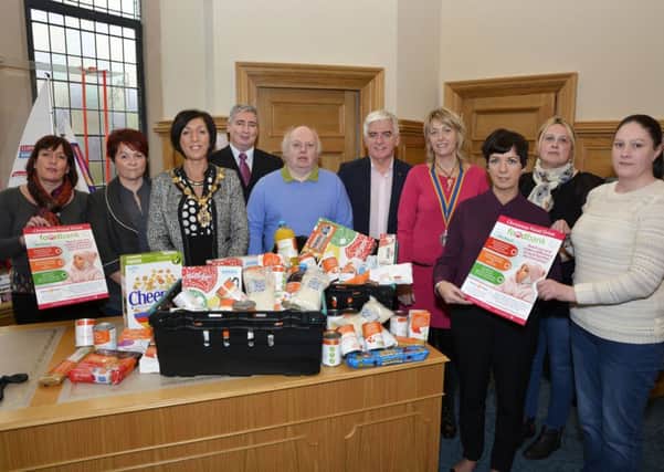 The Mayor, Councillor Brenda Stevenson pictured with organisers and volunteers at the launch of the Christmas Food Bank in the Guildhall before Christmas.