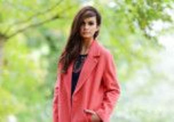 This stunning coral winter coat is now on Sale at Sarah-Jane Boutique, limited stock and sizes remaining.