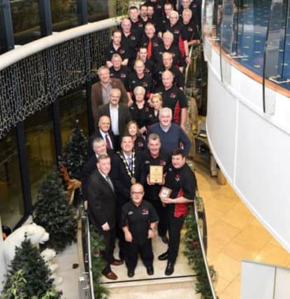 Members of Dundrod and District Motorcycle Club are recognised at a reception hosted by Lisburn City Council for all their hard work and dedication in ensuring the Ulster Grand Prix Bike Week is an annual success. The Club was acknowledged by Alderman Paul Porter, Chairman of the Council's Leisure Services Committee and the Mayor of Lisburn, Councillor Andrew Ewing.
