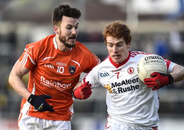 Armagh's Stefan Forker moves in on Tyrone's Peter Harte in the recent clash between the sides.