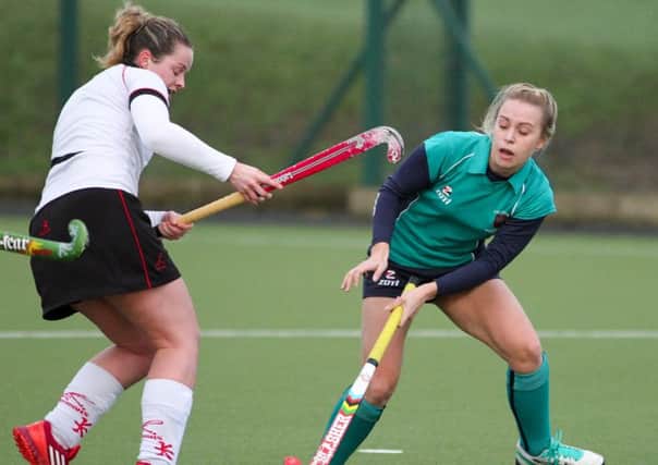 Carrick's Lois Passmore pushes upfield in the match against Priorians. INLT 03-410-RM